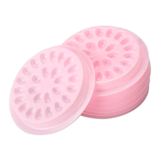 Bandejas desechables para extensiones de pestañas.